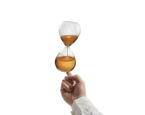 Index finger balancing hourglass — Stock Photo, Image