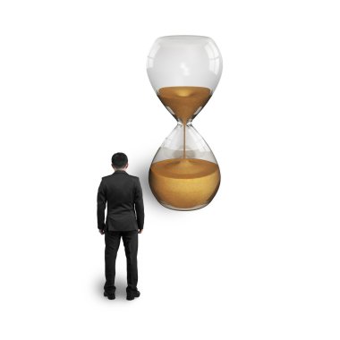 düşünme ve kum saati seyir ayakta işadamı