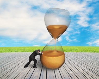 işadamı iterek tilt kum saati