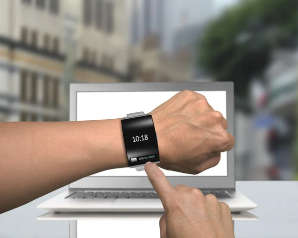 Man hand wearing black glass smartwatch with bent interface — Stock Photo, Image