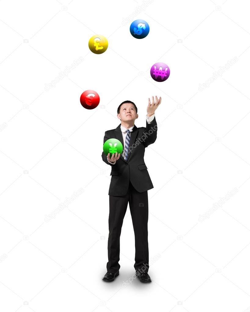 black suit businessman juggling currency symbol balls