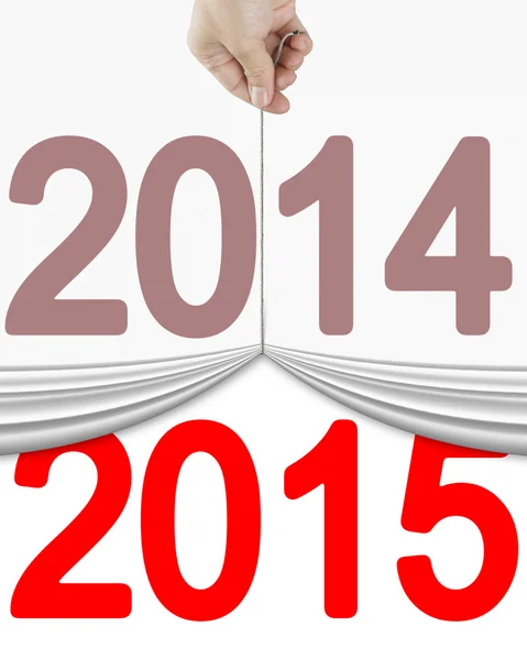 Hand omhoog oude 2014 gordijn te openen nieuwe 2015 te trekken — Stockfoto