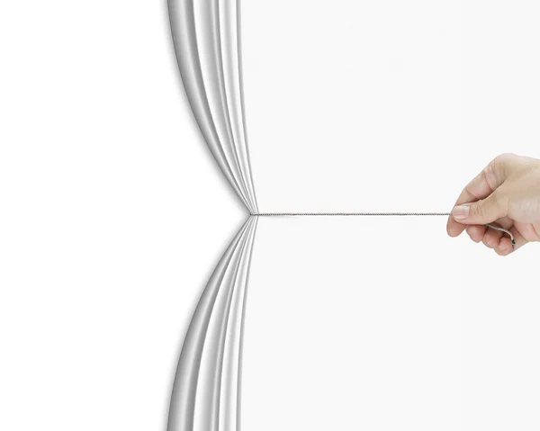 Human hand pulling open white blank curtain with empty behind — Stock Photo, Image