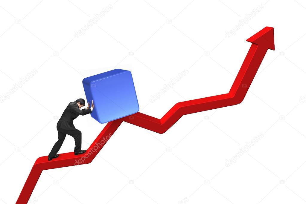 businessman pushing blue 3D cube upward on red trend line