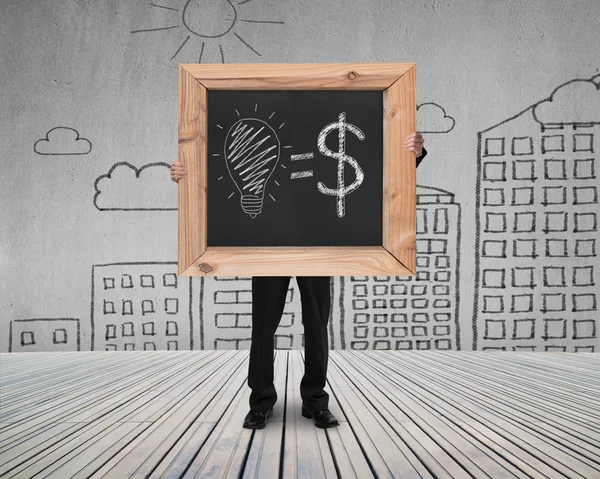 Businessman hold blackboard with hand-drawn ideas equal money co — Stock Photo, Image