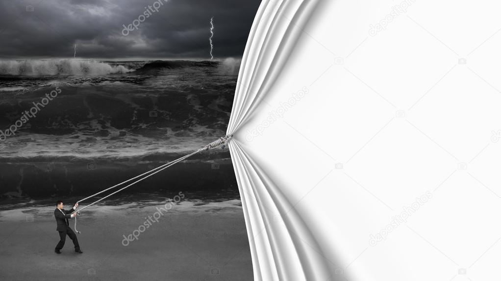 businessman pulling open blank curtain covered dark stormy ocean