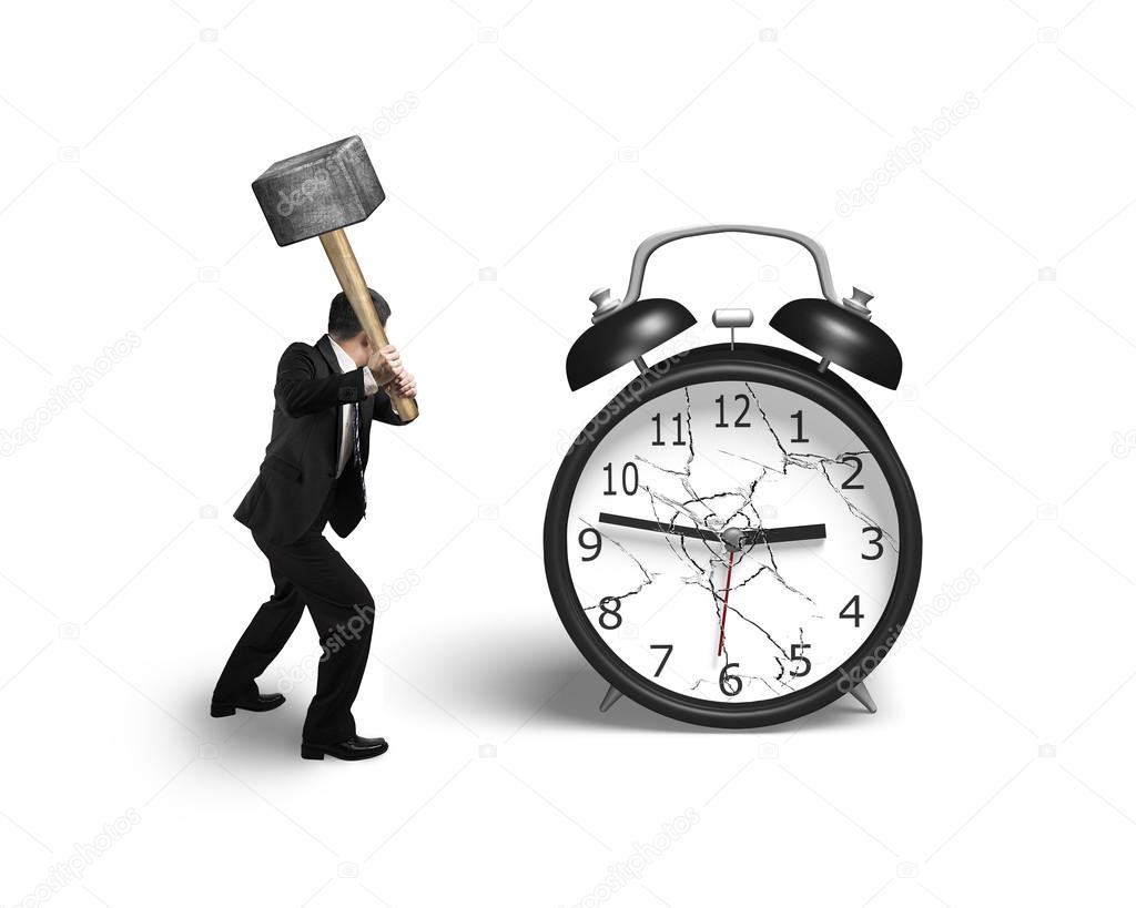 businessman hand holding sledgehammer hitting alarm clock with b