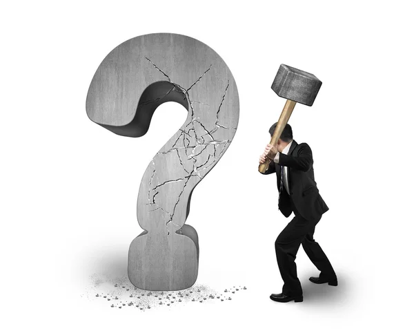 Businessman holding hammer cracked question mark isolated on whi — Stock Photo, Image