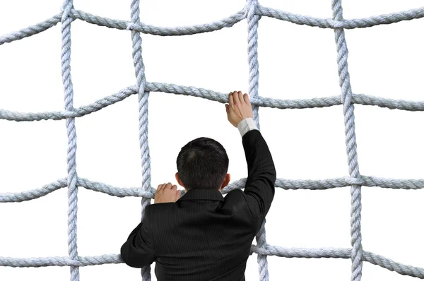 Empresario escalando red de cuerda entrecruzada aislado en blanco — Foto de Stock