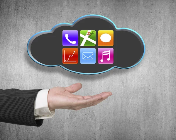 Male hand showing black cloud with colorful app icons — Stok fotoğraf