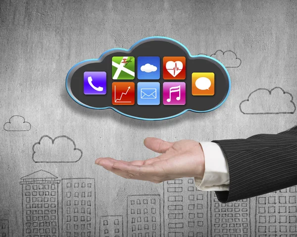 Man hand showing black cloud with colorful app icons — Stok fotoğraf