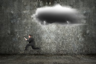 Running businessman holding tablet with dark clouds raining and  clipart