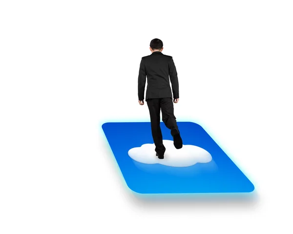 Rear view businessman standing on cloud icon with white backgrou — Stock Photo, Image