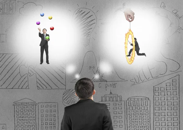 Business man imagining work situation with doodles concrete wall — Stock Photo, Image