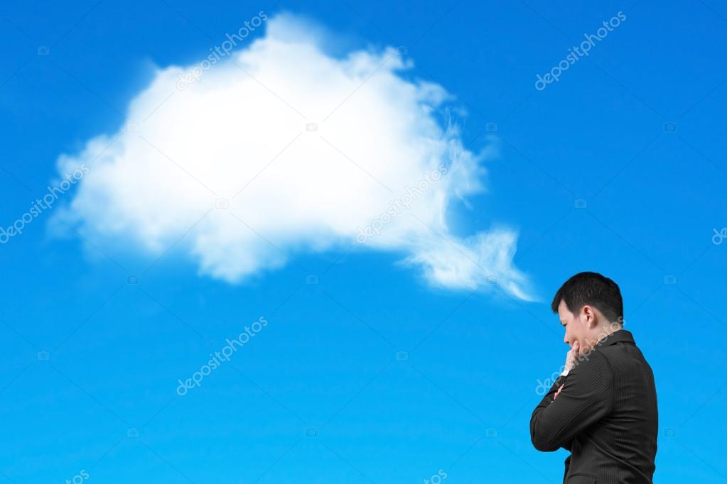 Businessman thinking about white cloud thought bubble isolated o