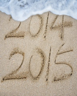 New year 2015 replace 2014 on sand beach 