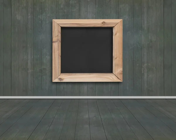 Wood frame of blank blackboard with dark green wooden room — Stock Photo, Image