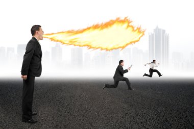Angry boss yelling at employees and spitting fire from mouth clipart