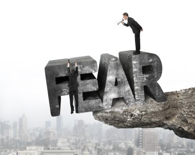 Boss using megaphone employee hanging fear word edge cliff citys