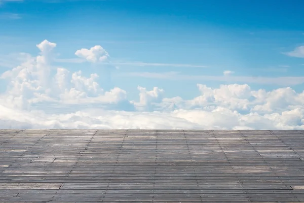 Old vertical striped wooden terrace with sunny sky cloudscape — Stock fotografie