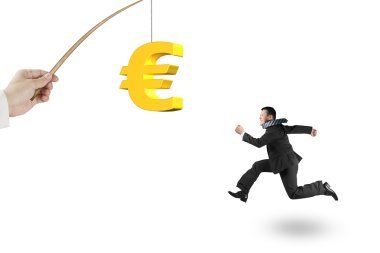 Man running golden euro symbol fishing lure isolated on white
