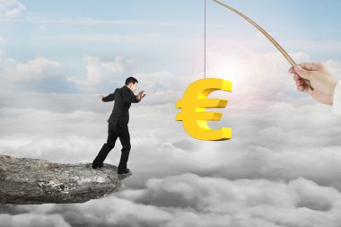 Man balancing golden euro symbol fishing lure with sun clouds