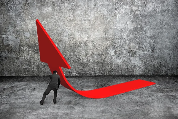 Man pushing red trend 3D arrow up — Zdjęcie stockowe