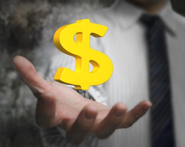 İş adamın elinde altın dolar işareti