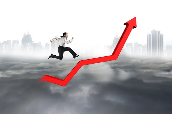 Business man running on red growth trend line — Stok fotoğraf