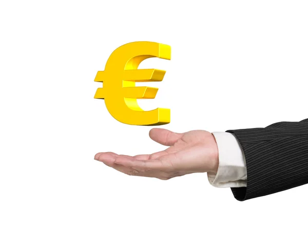 Segno euro dorato in mano all'uomo — Foto Stock