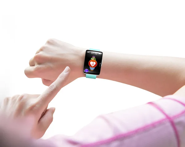 Sport woman finger pointing health sensor smart watch hand weari — Stock Photo, Image