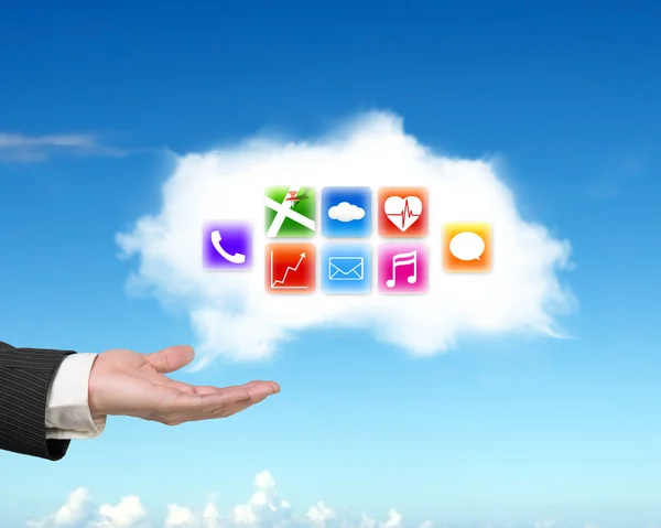 Male hand showing white cloud with colorful app icons — Stockfoto