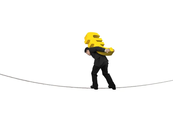 Businessman carrying golden euro sign balancing on tightrope — 图库照片