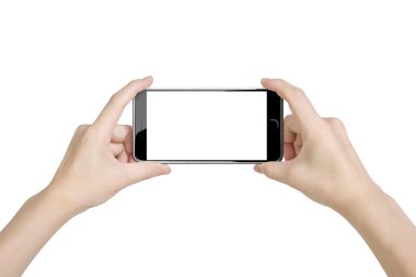 Woman hands holding smart phone with blank white touchscreen