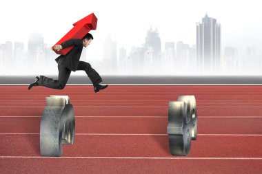 Businessman carrying arrow up jumping over currency symbol obsta