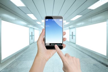 Female hands holding smart phone finger touching screen
