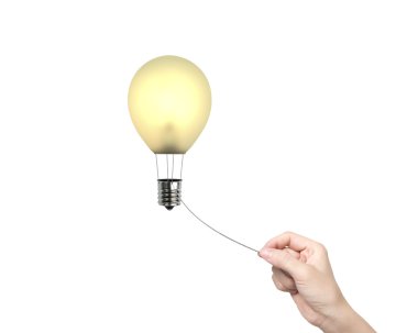 Kadın el ip çekerek ampul sıcak hava balonu bağlı