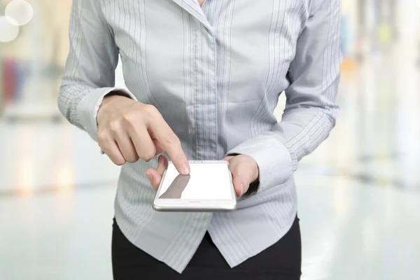 Woman using smart phone finger touching screen — ストック写真