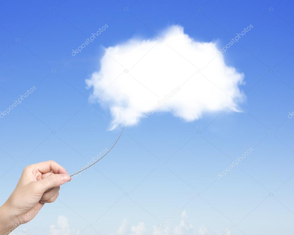 Woman hand pulling rope connected with one white cloud
