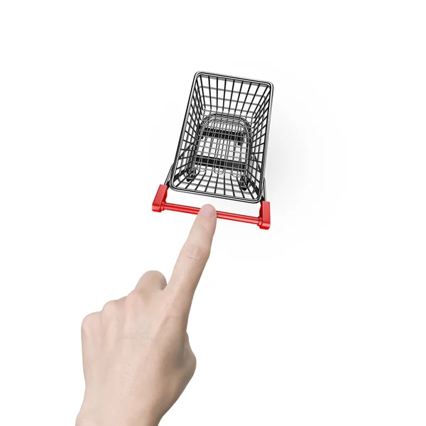 Woman forefinger pushing small empty shopping cart high angle vi — 스톡 사진