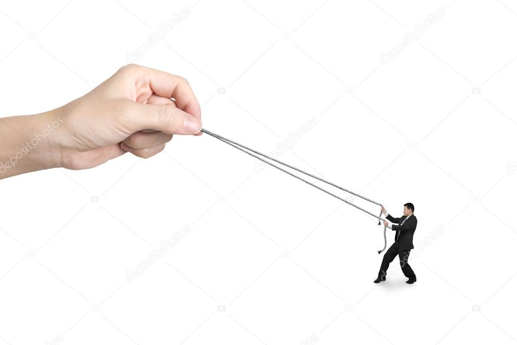 Businessman pulling rope against big woman hand