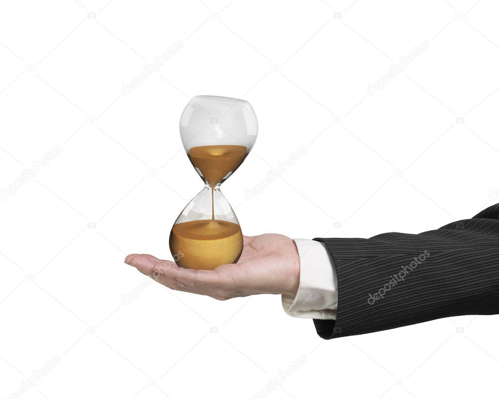 Hourglass in the business man's hand