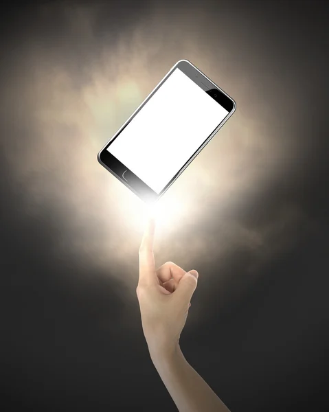 Dito umano puntando a smart phone — Foto Stock