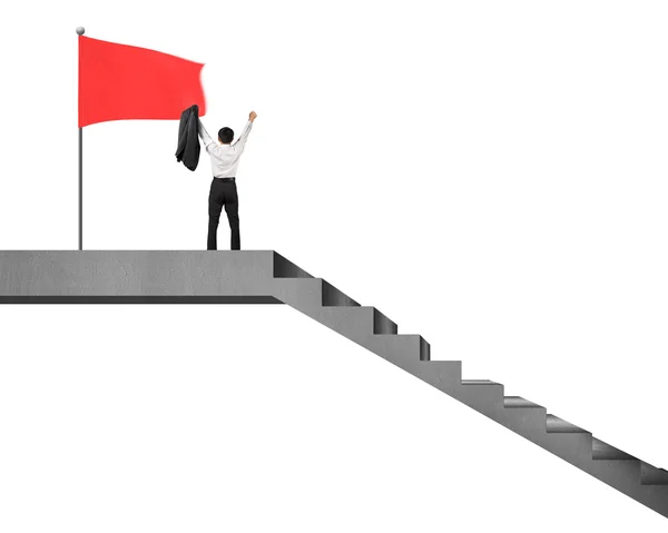 Businessman cheering on stairs top with flag isolated in white — Stock Photo, Image