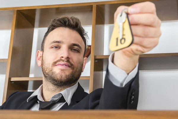 Receptionist Giving the Key — Stock Photo, Image