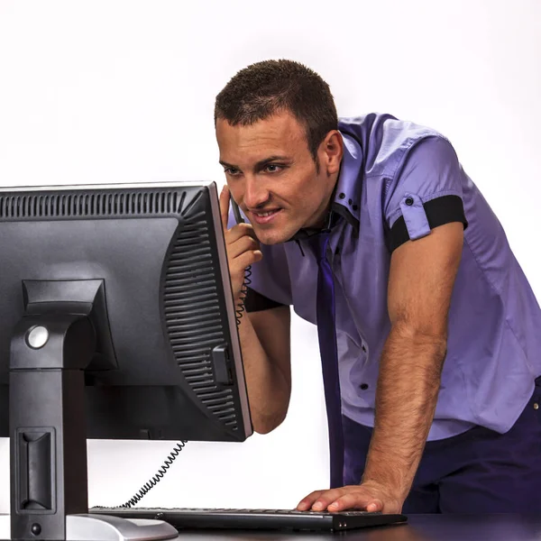 Young Casual Man Phone Front His Computer Screen Office — Stock Photo, Image