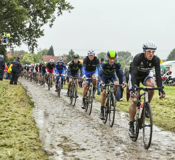 The Peloton on a Cobbled Road- Tour de France 2014 — Stock Photo, Image