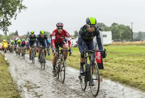 The Peloton on a Cobbled Road- Tour de France 2014 — Stock Photo, Image