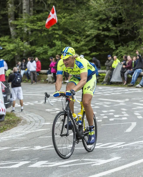 Oleg Thinkov montando una bicicleta en Le Markstein — Foto de Stock