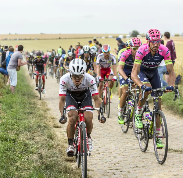 The Peloton on a Cobblestoned Road - Tour de France 2015 — Stock Photo, Image